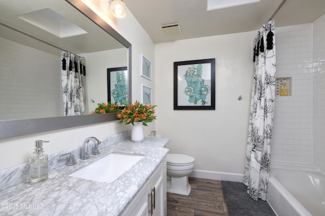 full bathroom with shower / bath combination with curtain, vanity, toilet, and hardwood / wood-style floors