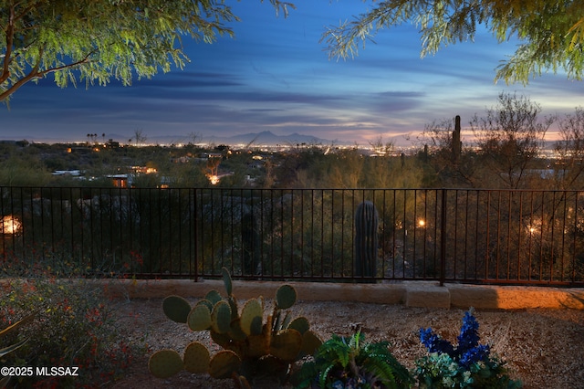 yard at dusk with a mountain view