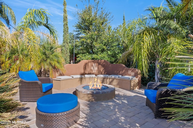 view of patio / terrace featuring a fire pit