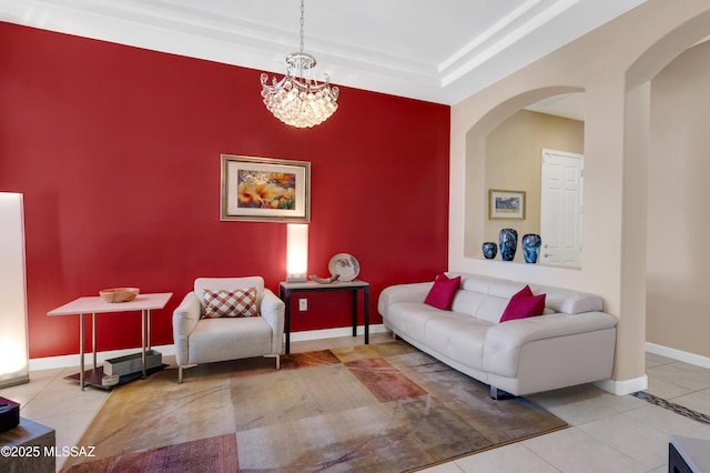 living room with tile patterned flooring and a chandelier