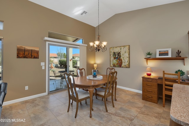 dining room with high vaulted ceiling and a notable chandelier