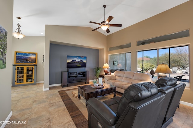 living room featuring lofted ceiling and ceiling fan