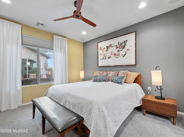 carpeted bedroom featuring ceiling fan