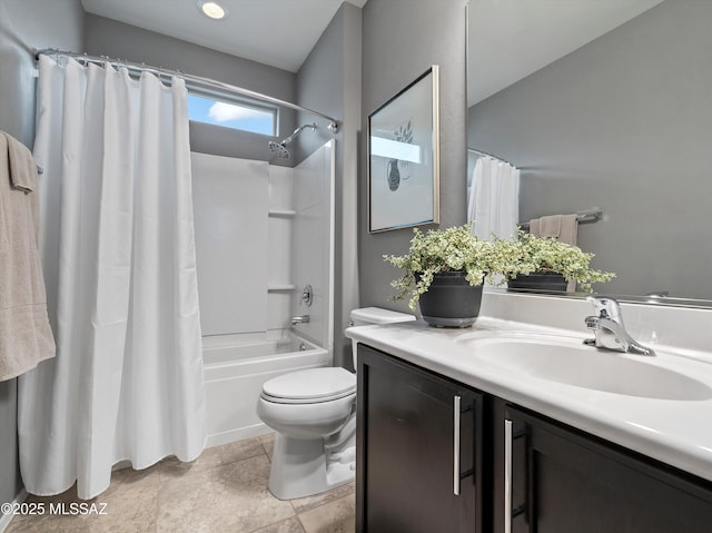 full bathroom with shower / bath combination with curtain, vanity, and toilet