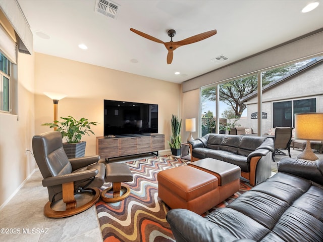 living room with ceiling fan