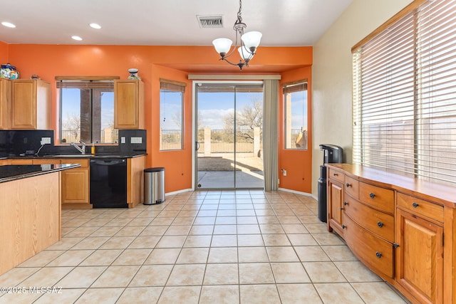 kitchen featuring light tile patterned floors, a notable chandelier, visible vents, black dishwasher, and backsplash