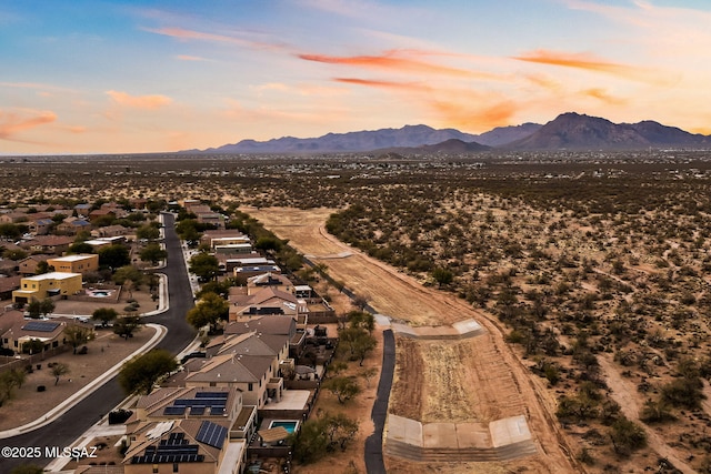 drone / aerial view with a residential view and a mountain view