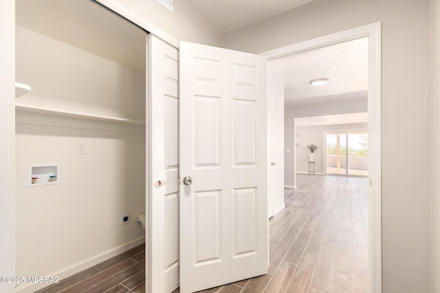 laundry room featuring electric dryer hookup and washer hookup