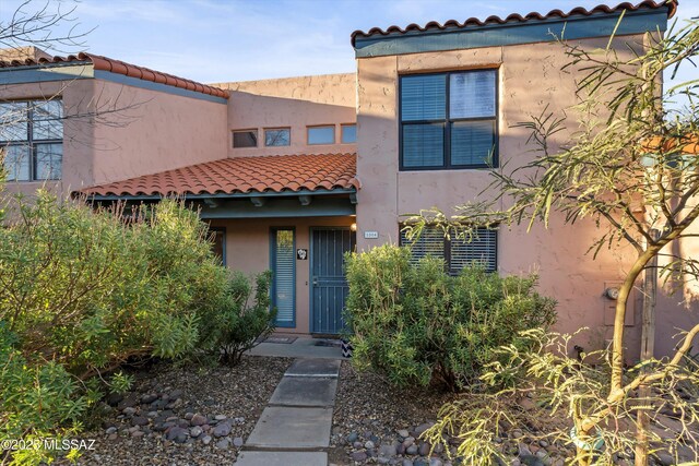 view of home's exterior with stucco siding