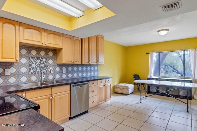 kitchen featuring dishwasher, sink, light brown cabinets, decorative backsplash, and light tile patterned floors