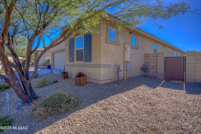 view of home's exterior with a garage