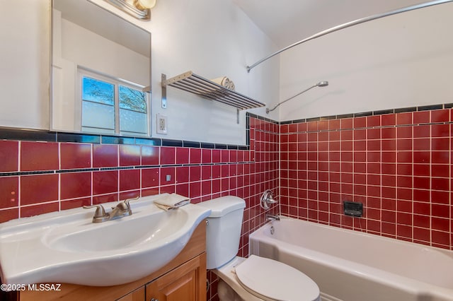 full bathroom featuring tile walls, tiled shower / bath combo, vanity, decorative backsplash, and toilet