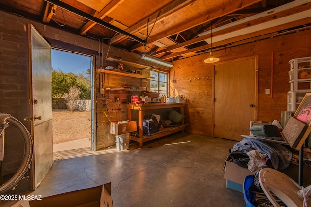 misc room with concrete flooring