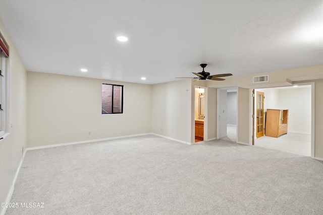 interior space with ceiling fan