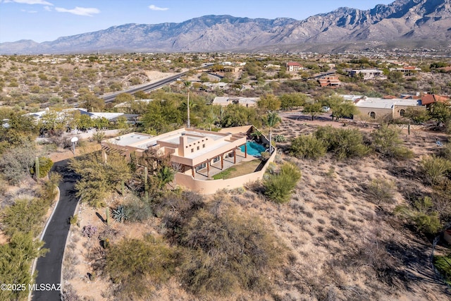 bird's eye view with a mountain view