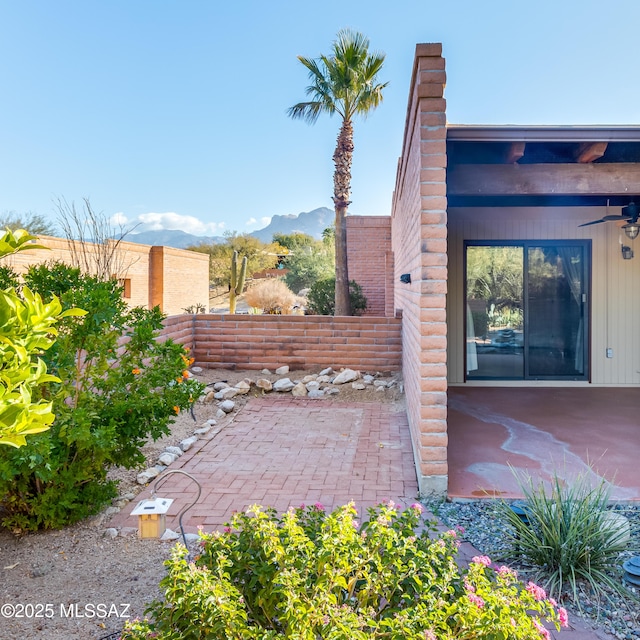 view of patio featuring a mountain view