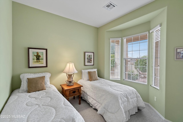 bedroom featuring carpet