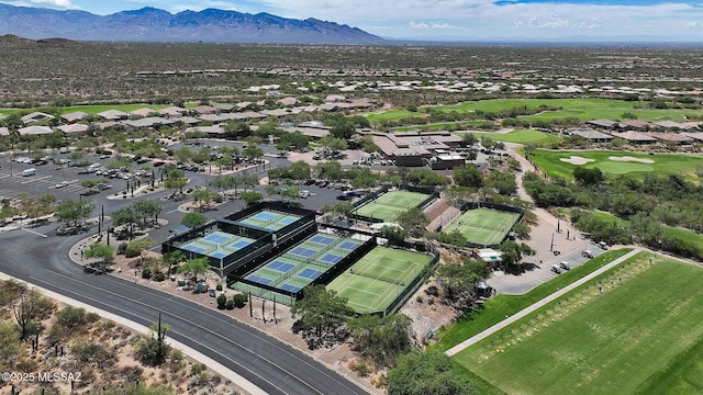 birds eye view of property with a mountain view