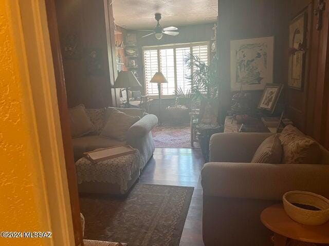 living room with ceiling fan