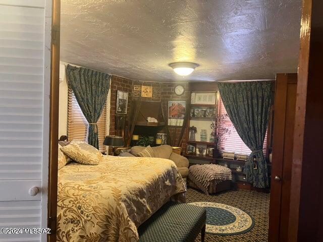 bedroom featuring a textured ceiling