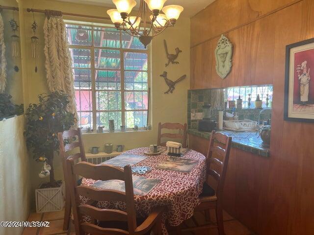 dining area with a notable chandelier