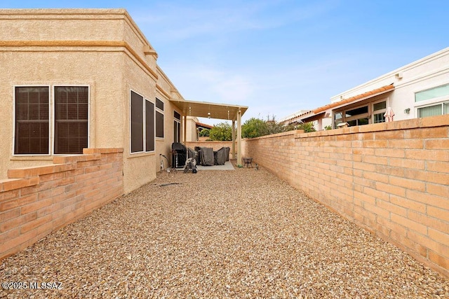 view of yard with a patio area