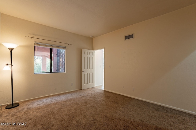 view of carpeted spare room