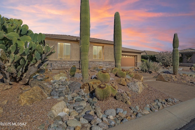 view of front of property featuring a garage