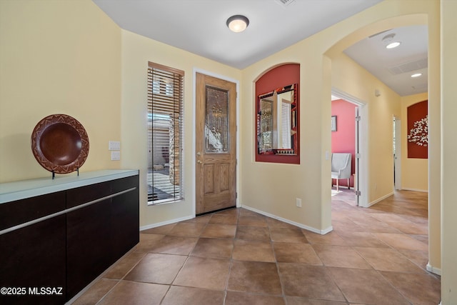 entrance foyer featuring tile patterned floors