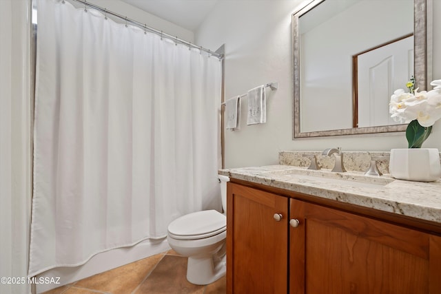 bathroom featuring tile patterned flooring, vanity, toilet, and a shower with shower curtain