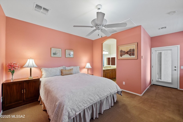 carpeted bedroom featuring connected bathroom and ceiling fan