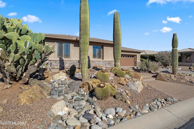 view of front of property with a garage