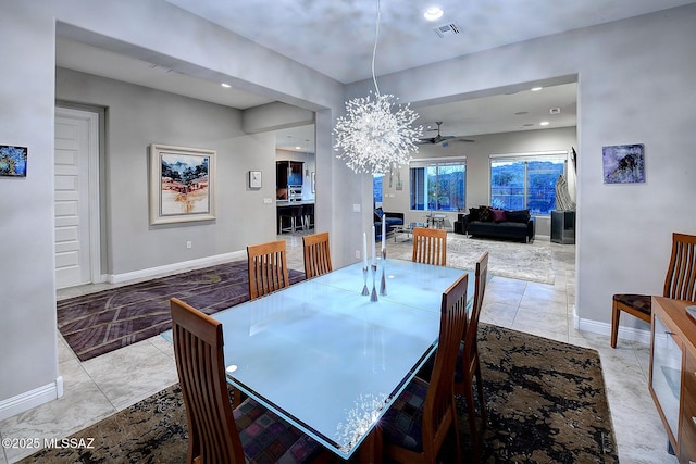 dining area with a notable chandelier