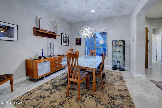 dining space featuring an inviting chandelier and light tile patterned floors