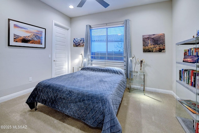 carpeted bedroom with ceiling fan