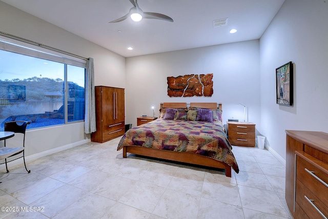 bedroom featuring light tile patterned flooring and ceiling fan