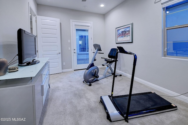 exercise area with light carpet