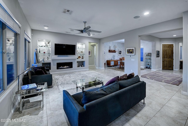 living room with ceiling fan