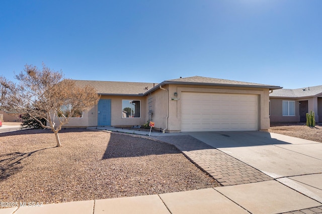 single story home with a garage