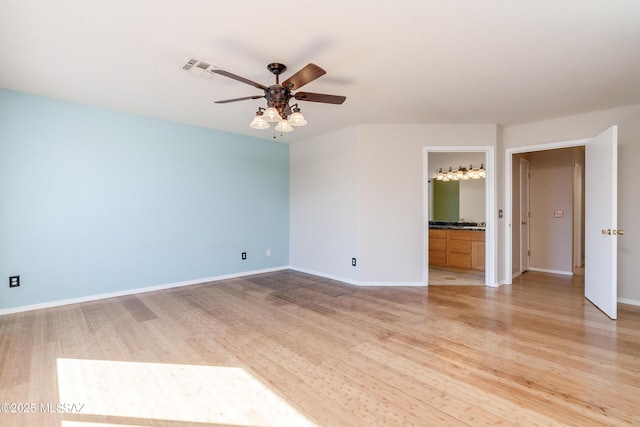 unfurnished room with ceiling fan and light hardwood / wood-style flooring