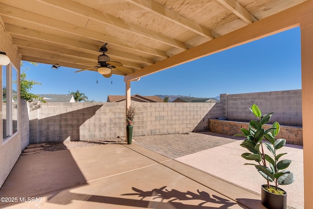 view of patio / terrace featuring ceiling fan