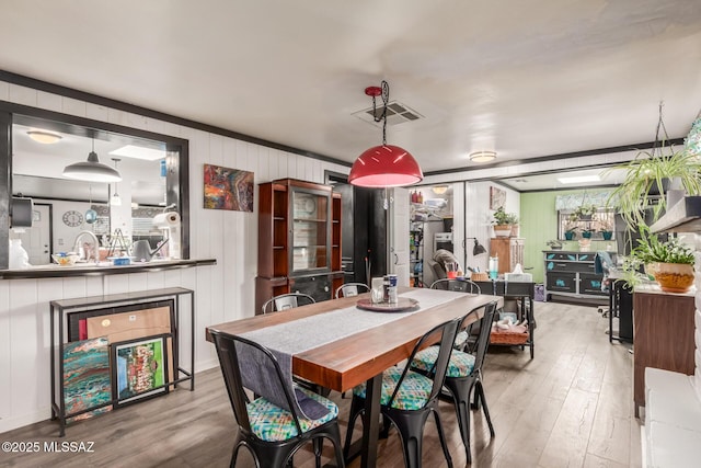 dining room featuring light hardwood / wood-style floors