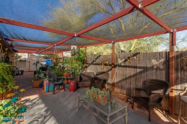 view of patio / terrace with an outdoor living space and a pergola