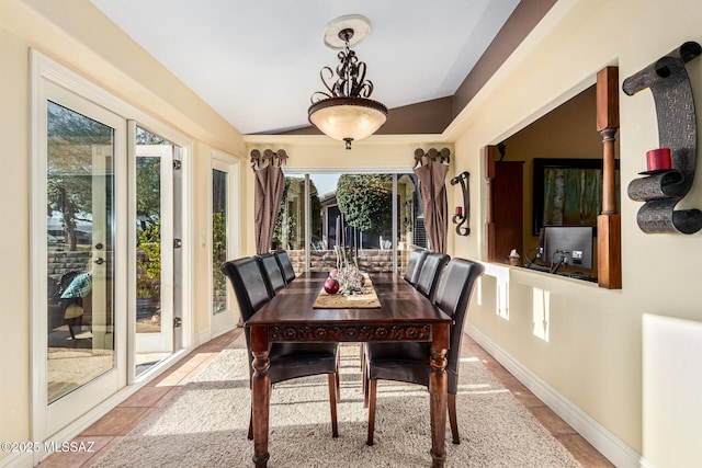 sunroom with vaulted ceiling and a wealth of natural light