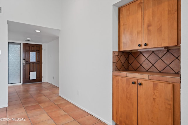 interior space with light tile patterned floors