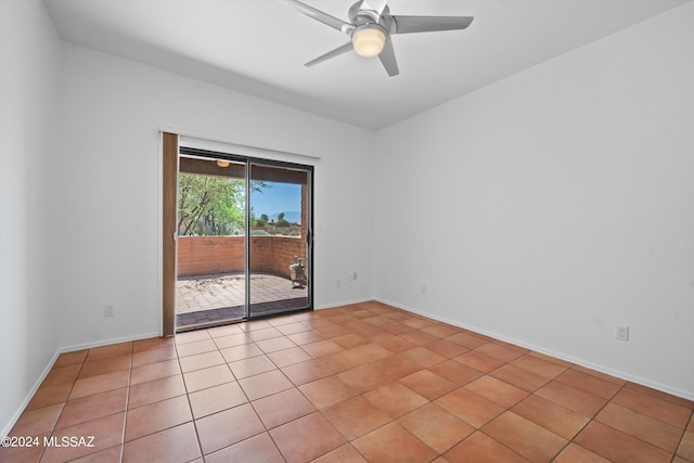 unfurnished room featuring light tile patterned floors and ceiling fan