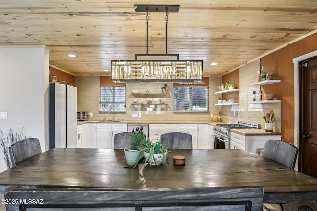 dining space with wooden ceiling and recessed lighting