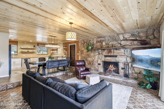 living room with wood ceiling and a fireplace