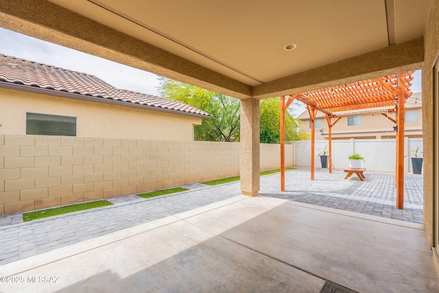 view of patio featuring a pergola