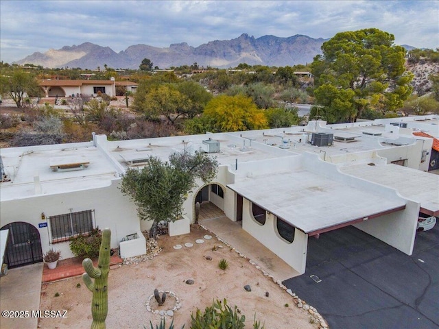 drone / aerial view featuring a mountain view